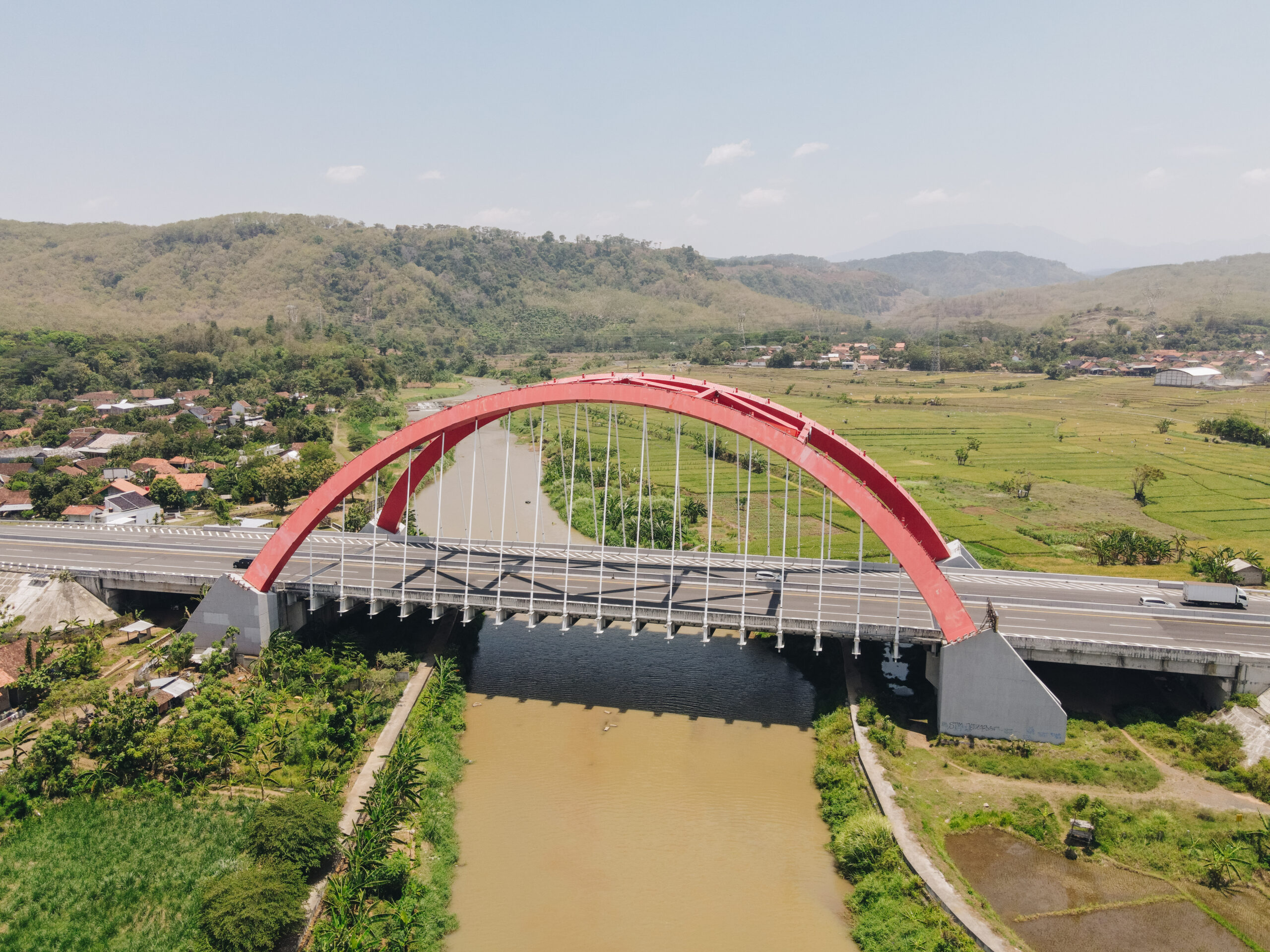 Aerial drone photography of a bridge named Jembatan Kalikuto in Batang, Indonesia.